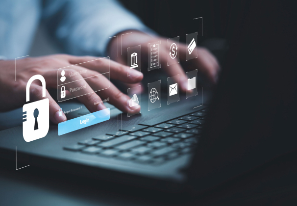 Person typing on a laptop with a digital padlock overlay representing User Access Control